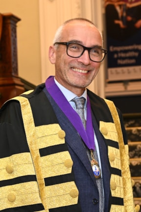 Prof Anthony O' Regan Profile Headshot of Dr Anthony O' Regan in his presidential gown. Dr O' Regan is President of RCPI
